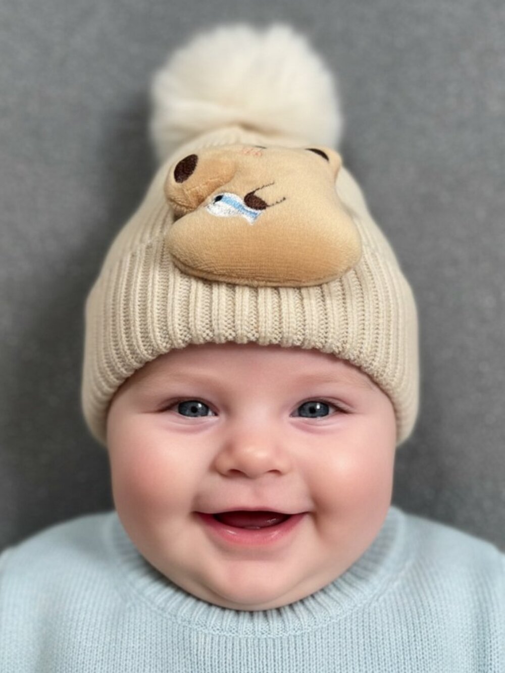 Kids Beige Cream Ribbed Knit Beanie Plush Capybara Patch & Faux Fur Pom Pom